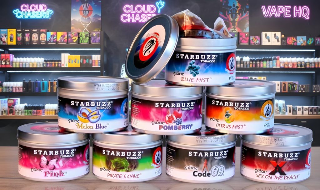 Assorted Starbuzz tobacco tins like Blue Mist and Pirate’s Cave stacked on a shelf in a popular shisha store Tulsa.