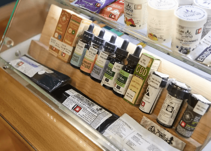 A professional display of premium cannabis tinctures, oils, and gourmet edibles available at this prominent cbd shop Tulsa.