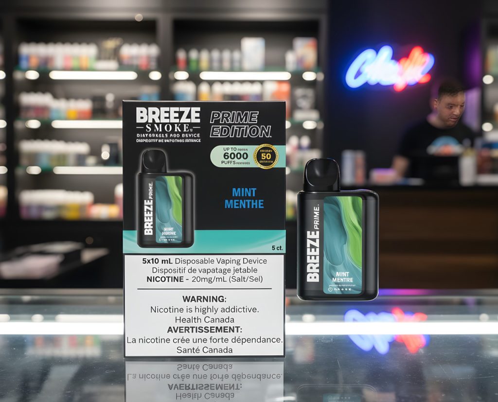 Mint Menthe Breeze Prime 6000 puff e-cigarettes Tulsa packaging with Health Canada nicotine warnings in a vape store.