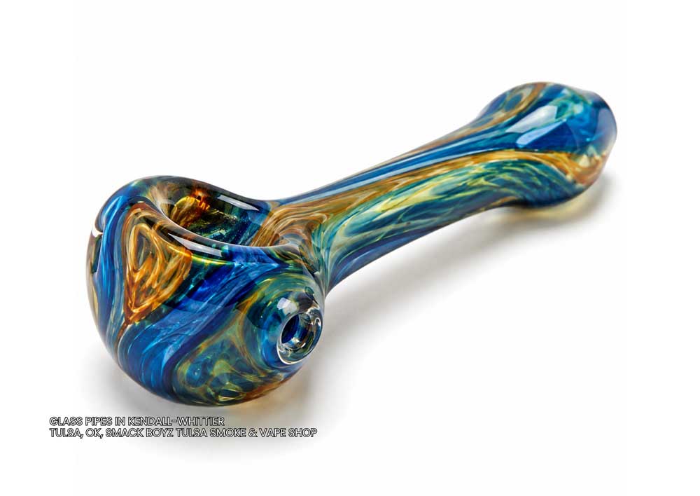 Handcrafted blue and gold swirling hand pipe, perfect for enthusiasts searching for quality glass pipes Tulsa offers.