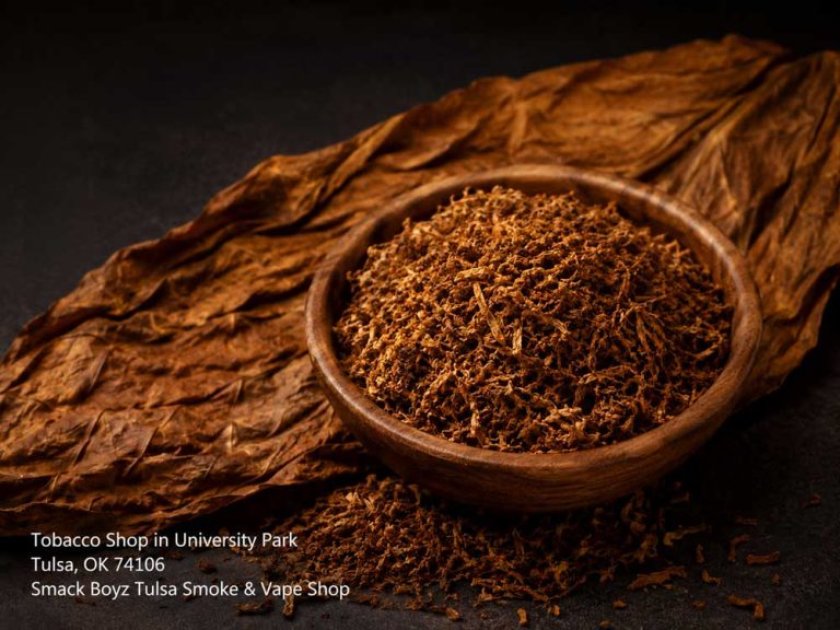 High quality loose leaf selection displayed on a cured leaf wrapper at a boutique tobacco shop Tulsa.